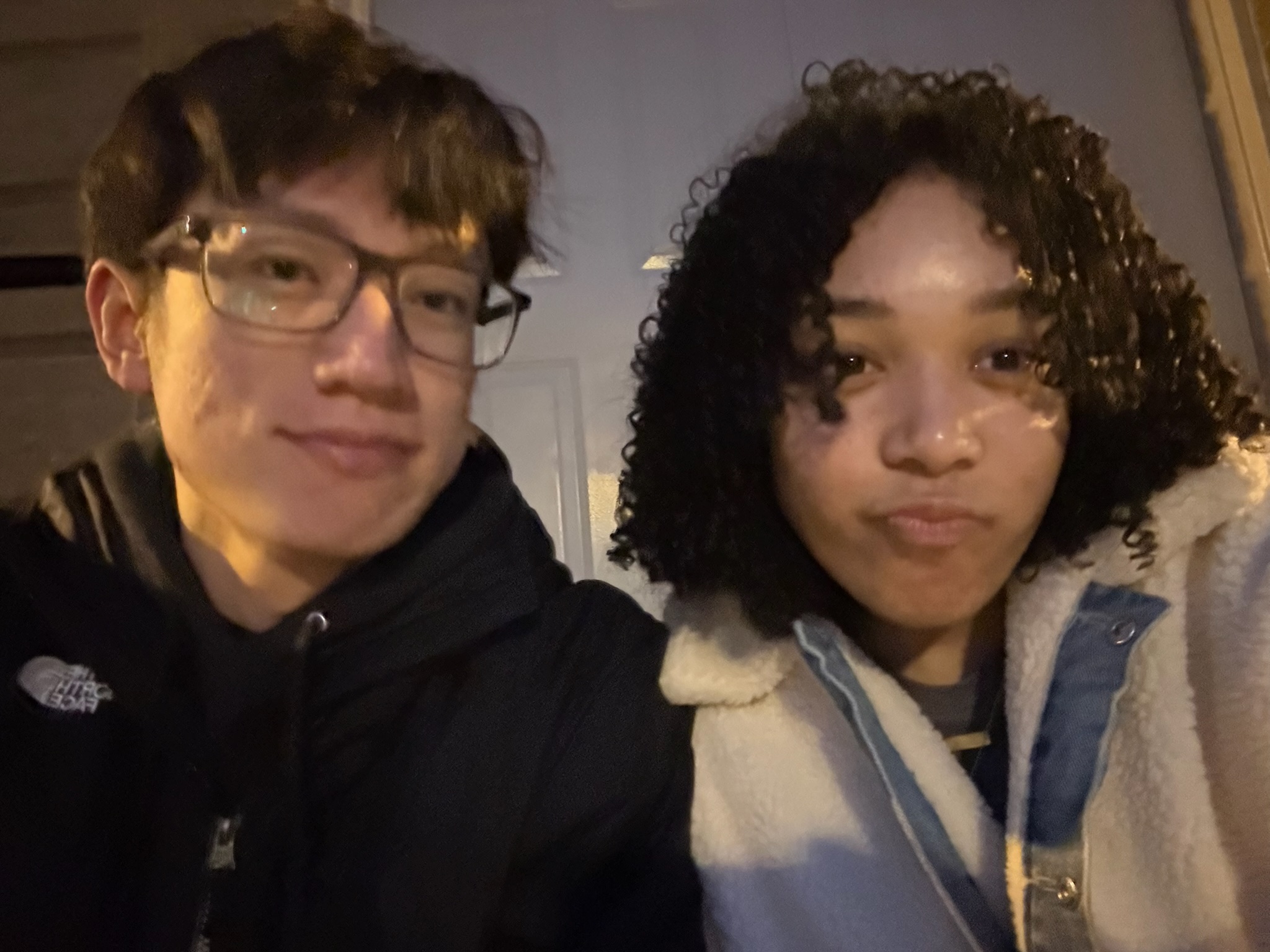 Makaia and Zuang posing together on a winter evening